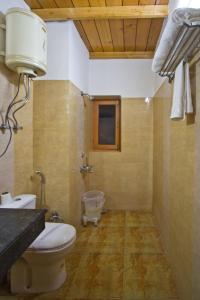 Kopalnica v nastanitvi Hotel Hayer Regency