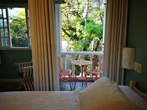 Cama ou camas em um quarto em Pousada Casablanca