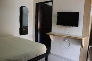TV a/nebo společenská místnost v ubytování Tita Tourist Resort