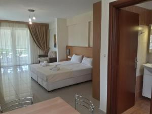 Ένα ή περισσότερα κρεβάτια σε δωμάτιο στο Alex House +57 φωτογραφίες