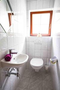 Kúpeľňa v ubytovaní Ferienwohnung Eller 79