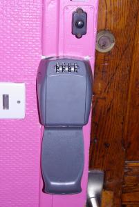a close up of a pink object on a wall at Rent4night Grenoble Europole in Grenoble