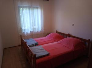 Postel nebo postele na pokoji v ubytování Apartments Placovici