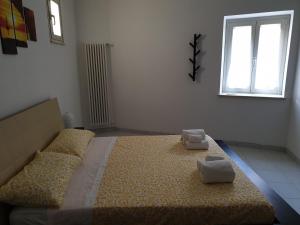 Postel nebo postele na pokoji v ubytování B&B "il Vicoletto"