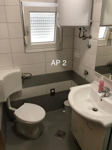 Koupelna v ubytování Apartments Zora