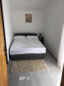 Postel nebo postele na pokoji v ubytování Apartments Zora