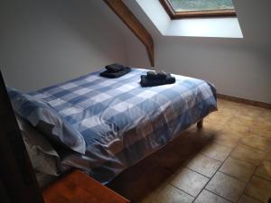 Postel nebo postele na pokoji v ubytování Le Botcol