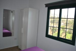 Posteľ alebo postele v izbe v ubytovaní Casa Bermudez