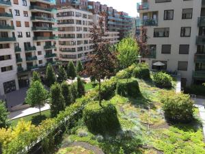 Vonkajšia záhrada v ubytovaní Corvin Residence Apartments