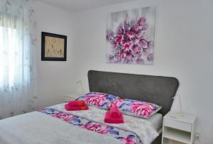 מיטה או מיטות בחדר ב-Prestige West Residence