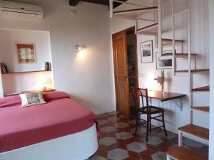 Postel nebo postele na pokoji v ubytování Casa Puccini B&B Maratea