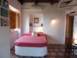 Postel nebo postele na pokoji v ubytování Casa Puccini B&B Maratea