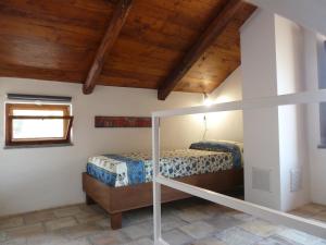 Postel nebo postele na pokoji v ubytování Casa Puccini B&B Maratea