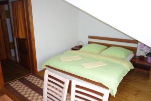 Postel nebo postele na pokoji v ubytování Ubytovanie DITA
