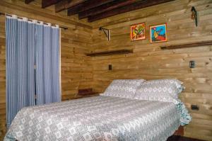 Een bed of bedden in een kamer bij xuetama