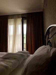 A bed or beds in a room at ELSADA