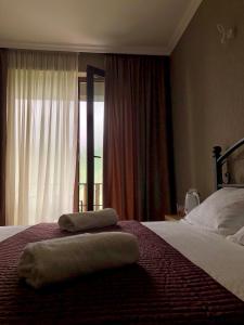 A bed or beds in a room at ELSADA