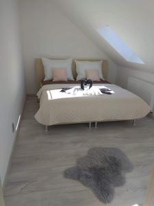 Postel nebo postele na pokoji v ubytování VIP suite hotel Heinz