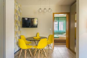 TV a/nebo společenská místnost v ubytování Willa Onyks Apartamenty