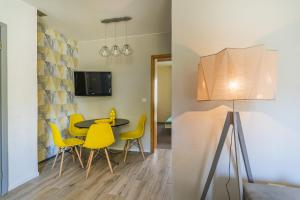 TV a/nebo společenská místnost v ubytování Willa Onyks Apartamenty