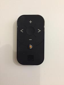 a black cell phone hanging on a wall at Studio climatisé, La Cloison in Arles
