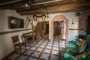 TV a/nebo společenská místnost v ubytování Casa Rural "El Olivo"