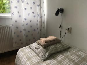 Un pat sau paturi într-o cameră la Veriora apartment