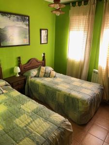 Postel nebo postele na pokoji v ubytování Casas Encinares