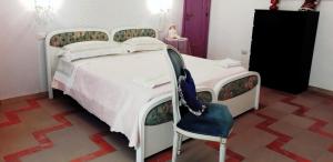 Voodi või voodid majutusasutuse Pisciotta House toas