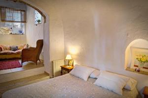 Posteľ alebo postele v izbe v ubytovaní La Casa de Bovedas Charming Inn