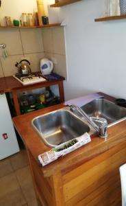 Virtuvė arba virtuvėlė apgyvendinimo įstaigoje La Casa Verde - Terraza- Arroyito Rio