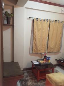Posezení v ubytování Las Pinas Serviced Apartment