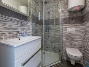 Kúpeľňa v ubytovaní Apartments Frutis + 37 fotografií
