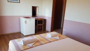 Postel nebo postele na pokoji v ubytování Apartments and Room Caric