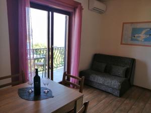 Posezení v ubytování Apartments and Room Caric