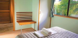 Tempat tidur dalam kamar di Broken River Mountain Resort