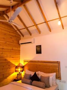 Voodi või voodid majutusasutuse Trinco Relax Hut toas