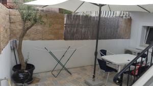 Patio alebo iná vonkajšia časť ubytovania Valentino