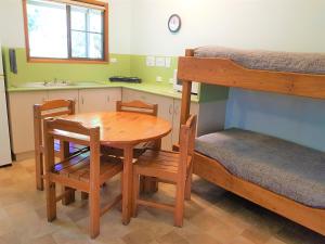 Tempat tidur dalam kamar di Broken River Mountain Resort