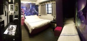 Letto o letti in una camera di Star City Hotel