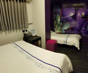 Letto o letti in una camera di Star City Hotel