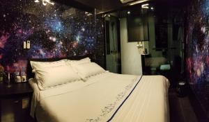 Letto o letti in una camera di Star City Hotel