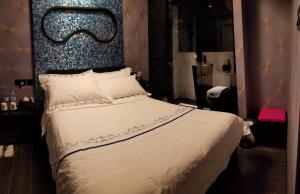 Letto o letti in una camera di Star City Hotel