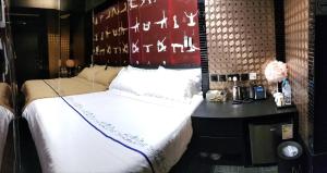 Letto o letti in una camera di Star City Hotel