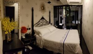 Letto o letti in una camera di Star City Hotel
