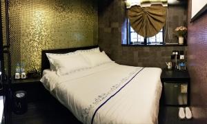 Letto o letti in una camera di Star City Hotel
