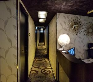 TV a/nebo společenská místnost v ubytování Star City Hotel + 37 fotografií