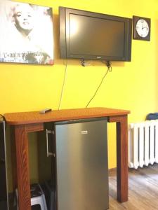 En TV eller et underholdningssystem på Du Draugai Apartment