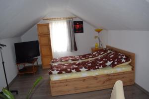 TV a/nebo společenská místnost v ubytování Elekes Apartmans