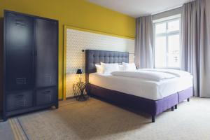 Postel nebo postele na pokoji v ubytování Hotel Goldene Traube - by Neugart